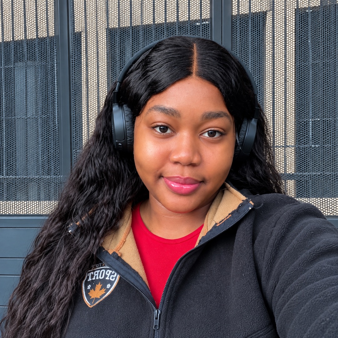 Shalom Rayhamen, the founder of Lagos Life, in a selfie wearing headphones